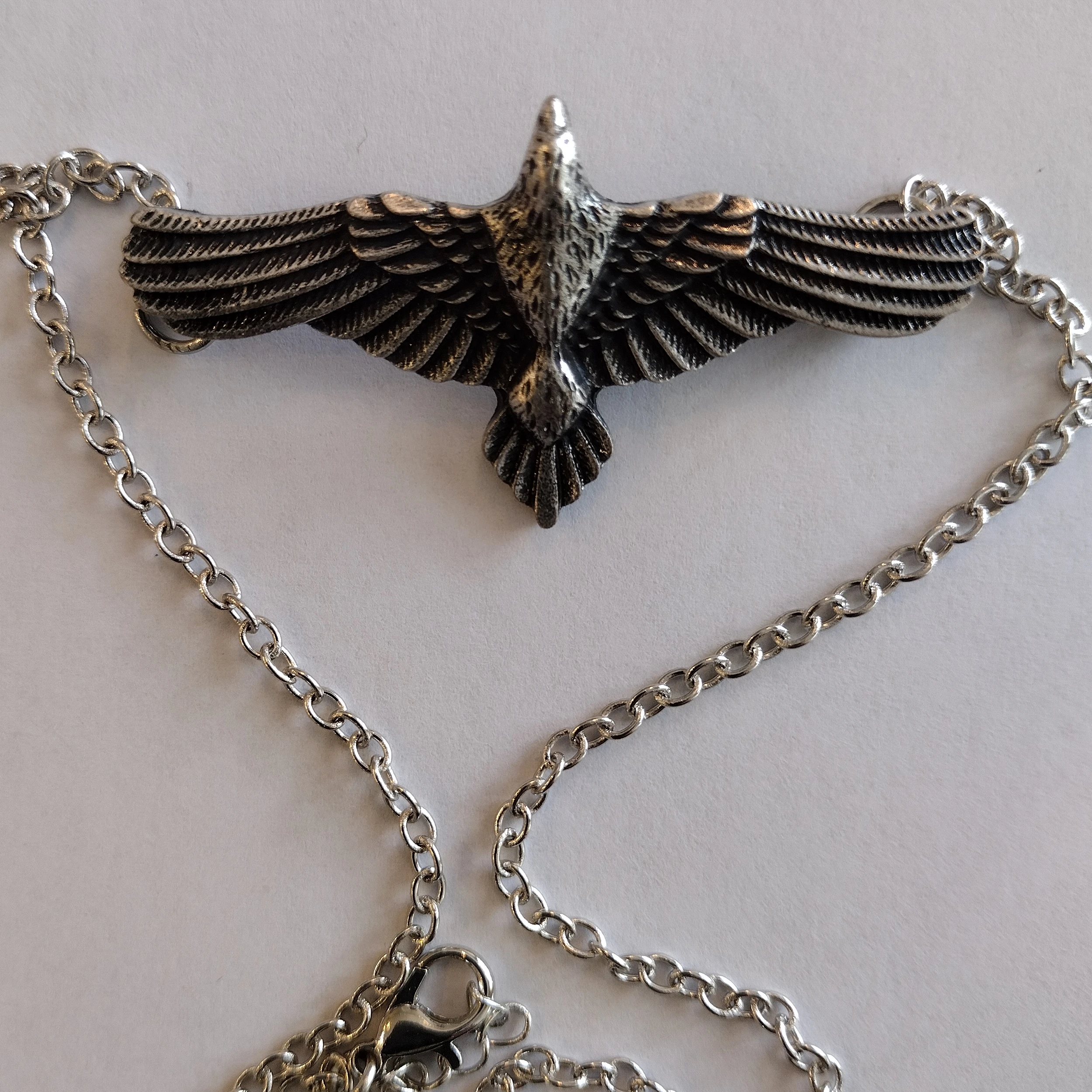 Product 1011: Raven In Flight, Silver Necklace Pendant: A Symbol of Wisdom, Sight, and Norse Heritage
